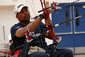 US Navy 110519-N-CD297-011 Retired Boatswain's Mate 1st Class Andre C. Shelby from Team Navy-Coast Guard participates in the compound archery compe.jpg