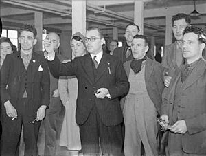 Billy Butlin visits a Munitions Factory