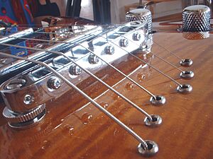 Bridge string thru body