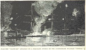Mosher pushes a fire raft against Hartford