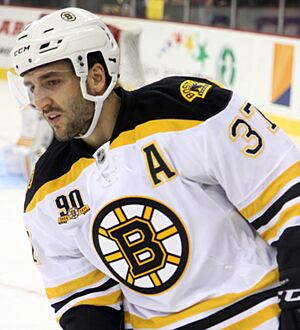 Patrice Bergeron playing with the Boston Bruins during a March 18, 2014 away game against the New Jersey Devils at the Prudential Center in Newark