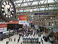 Clock and view over concourse, Waterloo Station, London