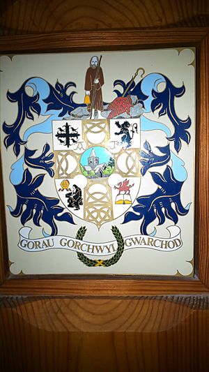 Coat of arms on south transept screen, St Padarn's Church, Llanbadarn Fawr