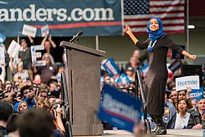 Ilhan Omar dances on stage at a Bernie Sanders rally in St Paul, Minnesota (49612442062)
