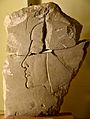 Limestone trial piece of a private person. Head of a princess on the reverse. Reign of Akhenaten. From Amarna, Egypt. Petrie Museum of Egyptian Archaeology, UCL, London