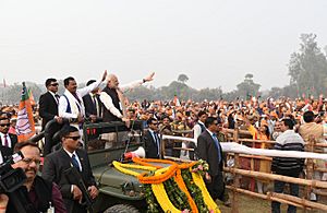 Prime Minister Narendra Modi greets people in Varanasi (1)
