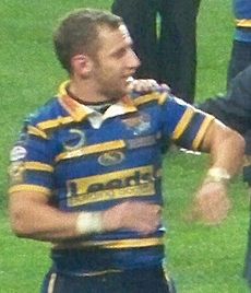 Rob Burrow after the 2009 Super League victory (cropped)