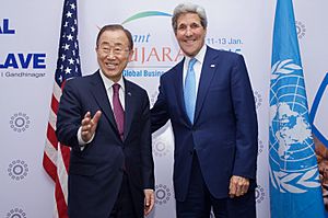 Secretary Kerry laughs with U.N. Secretary-General Ban before meeting on the sidelines of Vibrant Gujarat Summit