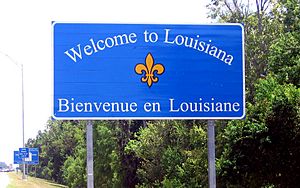 Signalisation routière bilingue à l'entrée de la Louisiane