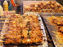 Street Food - Chicken skewers - Dakkochi (닭꼬치) (10585858164).jpg