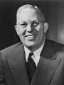 Earl Warren Portrait, half figure, seated, facing front, as Governor (cropped 3x4)