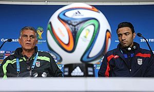 Iran manager Carlos Queiroz with captain, Javad Nekounam in press conference before Nigeria match, 2014 FIFA World Cup