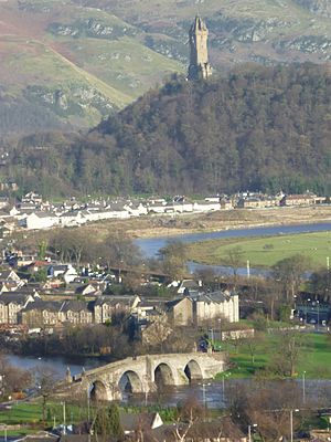 Old Stirling Bridge and the Abbey Craig with the Wallace Monument, Stirling Scotland.jpg