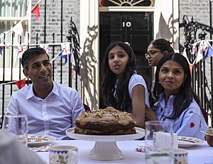 Prime Minister Rishi Sunak attends Coronation Big Lunch (52877779154) (cropped)