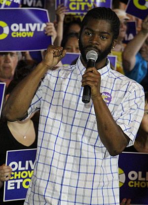 Adjei in 2014, introducing Olivia Chow at a campaign event in the 2014 Toronto mayoral election.