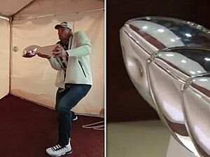 Rob Gronkowski denting the Lombardi Trophy