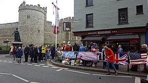 Crowds and journalists near Windsor Castle expecting on the occasion of birth of the child of Prince Harry and Meghan photo 2
