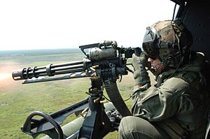 GAU-17 machine gun fired from UH-1N Huey in 2006