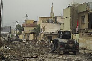ISOF APC on the street of Mosul, Northern Iraq, Western Asia. 16 November, 2016.jpg