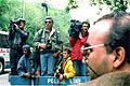 News photographers and reporters wait outside Jacqueline Kennedy Onassis' apartment