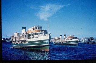 Sydney Ferries BARAGOOLA and NORTH HEAD both approaching Circular Quay wharf 24 Jan 1964