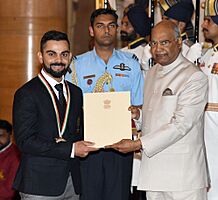 The President, Shri Ram Nath Kovind presenting the Rajiv Gandhi Khel Ratna Award, 2018 to Shri Virat Kohli for Cricket, in a glittering ceremony, at Rashtrapati Bhavan, in New Delhi on September 25, 2018