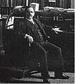 Wilbur Atwater seated