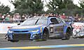 Chevrolet Camaro ZL1 NASCAR - Jenson Button, Jimmie Johnson & Mike Rockenfeller at Dunlop Chicane at the 2023 Le Mans (53368944895)