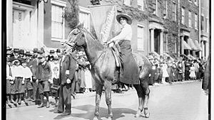 Madge Udall in a 1913 woman suffrage parade