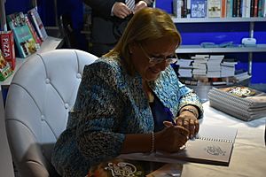 Marie Louise Coleiro Preca signing MCCF books at the MCC
