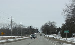 Looking west at the sign for Medina on WIS 96