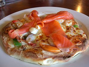 Seafood pizza with salmon