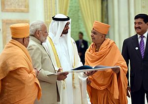The Temple Committee members presenting the Temple Literature to the Prime Minister, Shri Narendra Modi and the Crown Prince of Abu Dhabi, Deputy Supreme Commander of U.A.E. Armed Forces