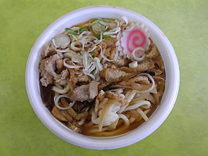 Bowl of udon on green tray