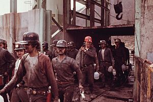 FIRST SHIFT OF MINERS AT THE VIRGINIA-POCAHONTAS COAL COMPANY MINE ^4 NEAR RICHLANDS, VIRGINIA, LEAVING THE ELEVATOR.... - NARA - 556393 tweaked