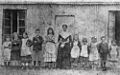 StateLibQld 2 292547 School children and teacher portrait at the Provisional School, Mount Britton, 1885