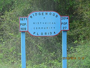 Area sign bearing the name Ridgewood, Florida