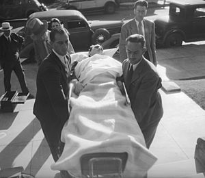 Busby Berkeley being carried into his manslaughter trial on a stretcher