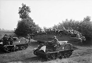DUKW and Universal Carriers of 5th Duke of Cornwall's Light Infantry, 43rd Division, Holland, 18 September 1944. BU934