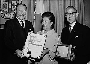 Los Angeles Mayor Sam Yorty Presenting Matsushita Day Certificate to Mr. and Mrs. Kōnosuke Matsushita at Los Angeles City Hall
