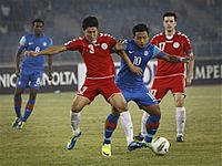 Zohib Islam Amiri (in red uniform) vs Jeje Lalpekhlua (in blue uniform)
