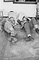 Australian soldiers resting during the Battle of Leuwiliang