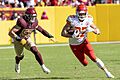 Cole Holcomb chasing Travis Kelce OCT2021 (cropped)