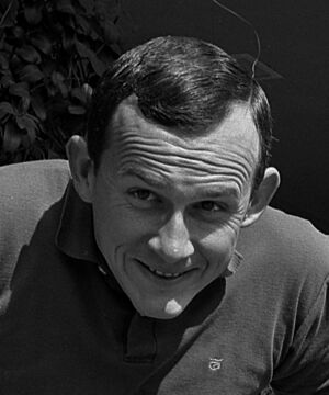 Dick Smothers playing about on tricycles (cropped).jpg