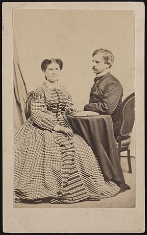 Major General Nathaniel Prentiss Banks of General Staff U.S. Volunteers Infantry Regiment in uniform, with his wife Mary Theodosia Palmer Banks, who holds an open book) - Henry F. Warren, LCCN2017659650