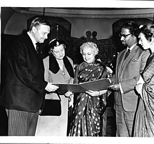 Mihir Sen being presented a certificate by Lord Freyberg on behalf of the Counsel Swimming Association at a function held at the India House, London
