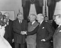 Photograph of George C. Marshall shaking hands with his predecessor as Secretary of State, James Byrnes, as President... - NARA - 199519