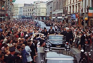 President's Trip to Europe- Motorcade in Dublin. President Kennedy, motorcade, spectators. Dublin, Ireland - NARA - 194227