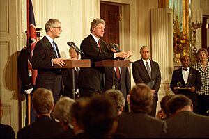 President Bill Clinton and British Prime Minister John Major delivering press statements in the East Room of the White House (36) (cropped)
