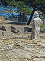 Remains of ancient Greek city of Neapolis with reproduction of Aesclepius at the archaeological site of Empúries